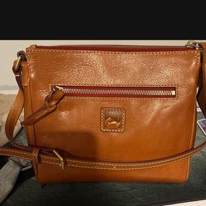 Authentic dooney bourke purse brand new. Bought it and never used it.